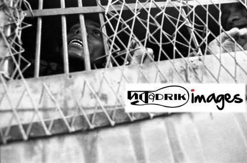 1745754650172779050729_Student in prison van 6774 pix.jpg
